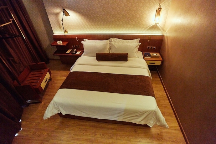 Imagen de la habitación del Hotel James Joyce Coffetel Qifu Xincun Branch. Foto 9