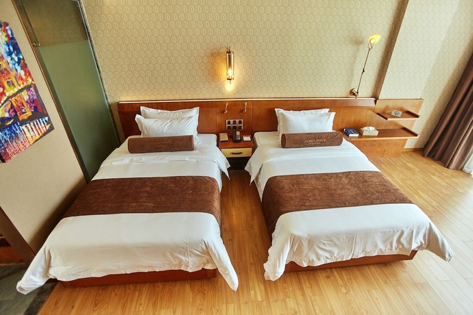 Imagen de la habitación del Hotel James Joyce Coffetel Qifu Xincun Branch. Foto 10