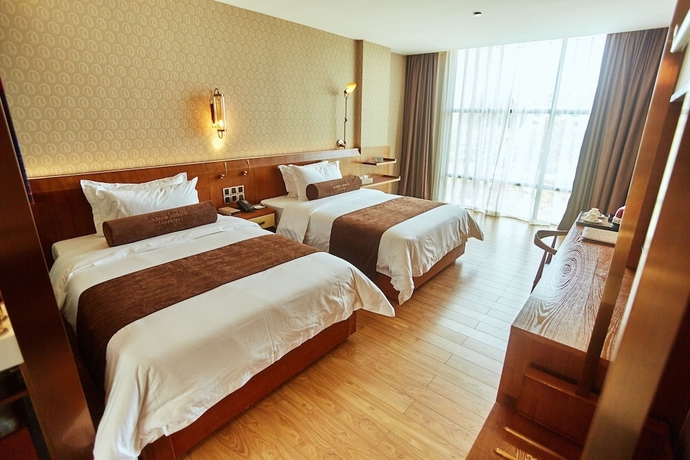 Imagen de la habitación del Hotel James Joyce Coffetel Qifu Xincun Branch. Foto 11