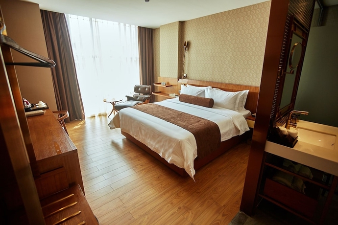 Imagen de la habitación del Hotel James Joyce Coffetel Qifu Xincun Branch. Foto 12