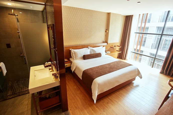 Imagen de la habitación del Hotel James Joyce Coffetel Qifu Xincun Branch. Foto 14