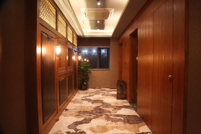 Imagen de los interiores del Hotel James Joyce Coffetel Qifu Xincun Branch. Foto 16