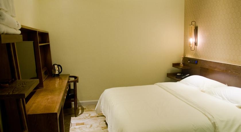 Imagen de la habitación del Hotel James Joyce Coffetel Tianhebei. Foto 1