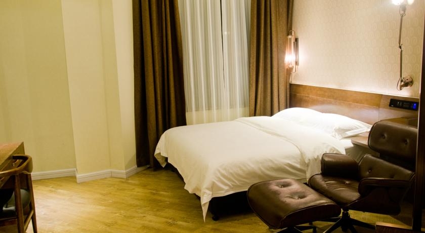 Imagen de la habitación del Hotel James Joyce Coffetel Tianhebei. Foto 4