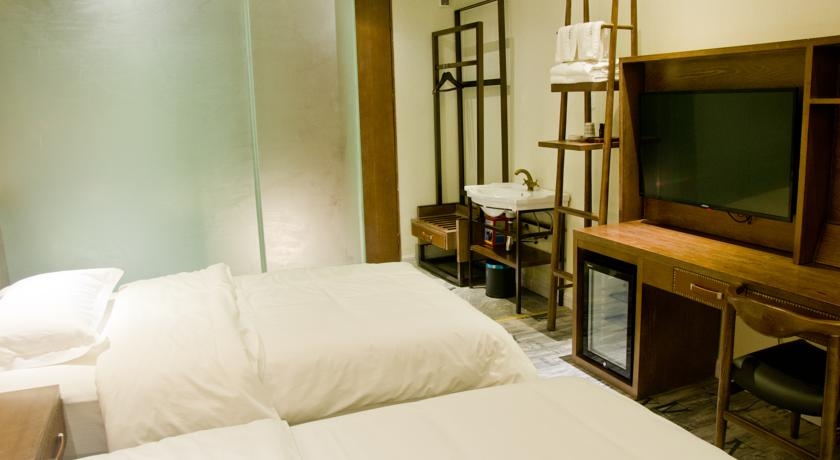 Imagen de la habitación del Hotel James Joyce Coffetel Tianhebei. Foto 5