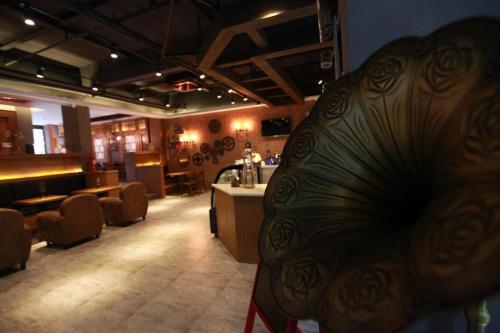 Imagen general del Hotel James Joyce Coffetel Wuxi Taihu Square Subway Station Branch. Foto 3