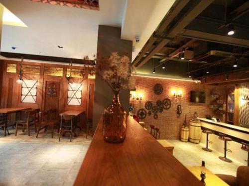 Imagen general del Hotel James Joyce Coffetel Wuxi Taihu Square Subway Station Branch. Foto 9