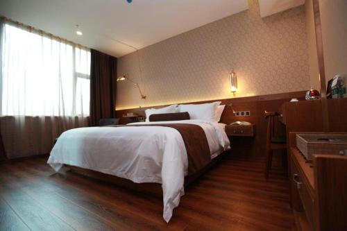 Imagen general del Hotel James Joyce Coffetel Wuxi Taihu Square Subway Station Branch. Foto 13