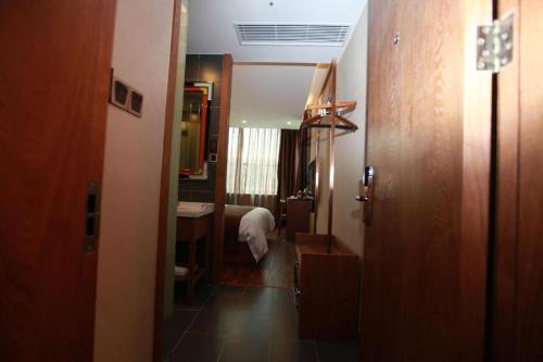 Imagen general del Hotel James Joyce Coffetel Wuxi Taihu Square Subway Station Branch. Foto 14