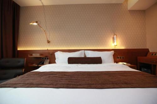 Imagen general del Hotel James Joyce Coffetel Wuxi Taihu Square Subway Station Branch. Foto 18