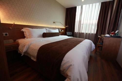 Imagen general del Hotel James Joyce Coffetel Wuxi Taihu Square Subway Station Branch. Foto 19