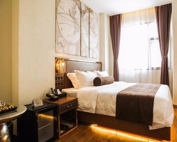 Imagen de la habitación del Hotel James Joyce Coffetel Xi'an Huaqingchi. Foto 2