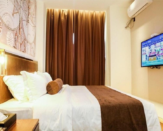 Imagen de la habitación del Hotel James Joyce Coffetel Xi'an Huaqingchi. Foto 8