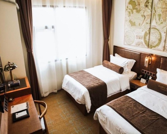 Imagen de la habitación del Hotel James Joyce Coffetel Xi'an Huaqingchi. Foto 12