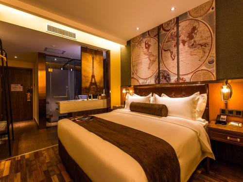 Imagen de la habitación del Hotel James Joyce Coffetel (Xi'an Nanmen Ming City Wall. Foto 6