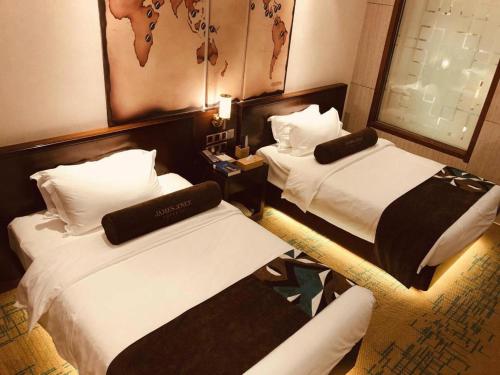 Imagen general del Hotel James Joyce Coffetel&middot; Tianjin Olympic Center Lingbin Road Metro Station. Foto 10