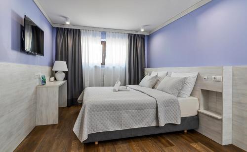 Imagen de la habitación del Hotel J&j Sport Center. Foto 2