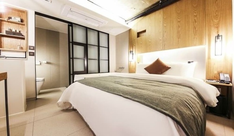 Imagen de la habitación del Hotel Jamsil Delight. Foto 4