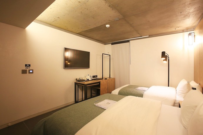 Imagen de la habitación del Hotel Jamsil Delight. Foto 5