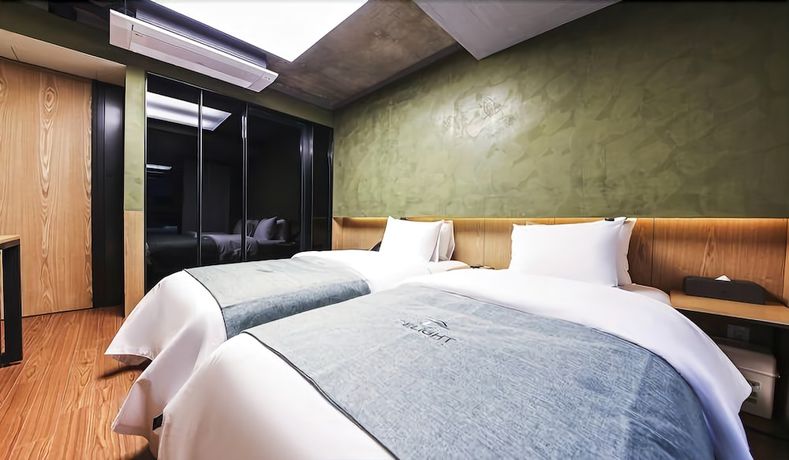 Imagen de la habitación del Hotel Jamsil Delight. Foto 6