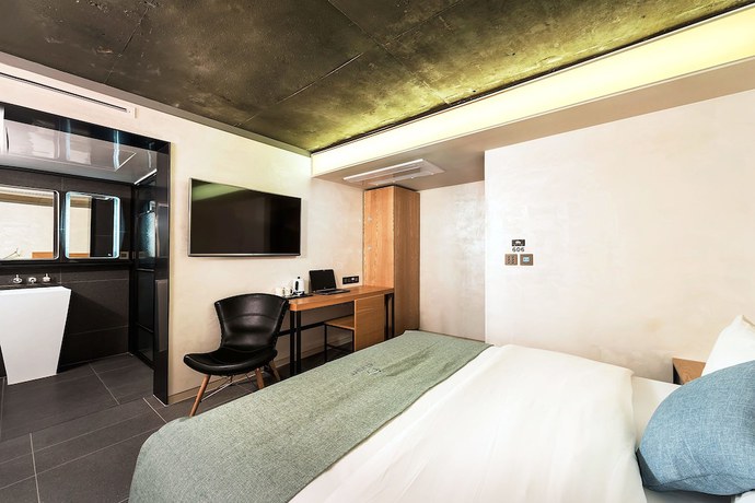 Imagen de la habitación del Hotel Jamsil Delight. Foto 9