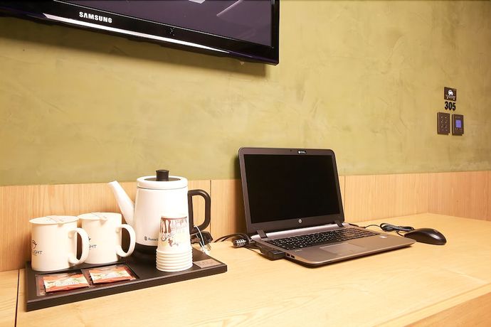 Imagen de la habitación del Hotel Jamsil Delight. Foto 11