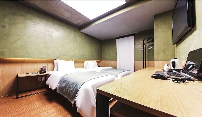 Imagen de la habitación del Hotel Jamsil Delight. Foto 12