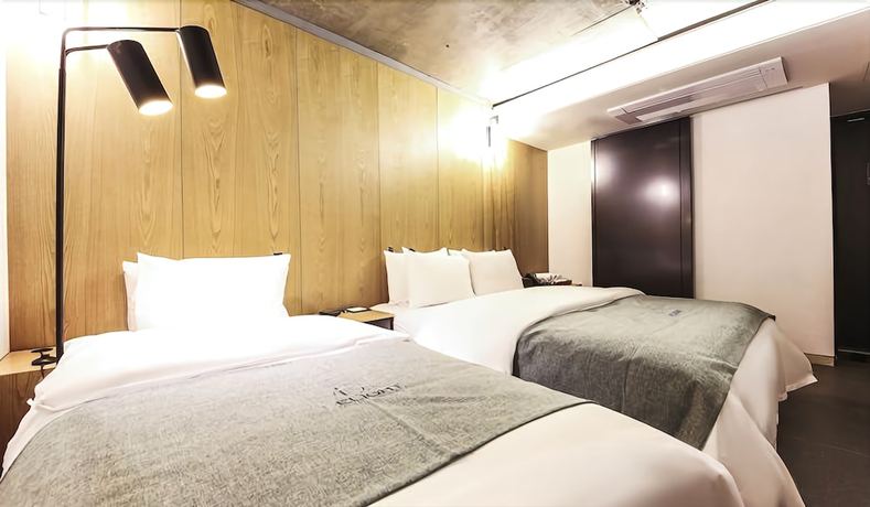 Imagen de la habitación del Hotel Jamsil Delight. Foto 15