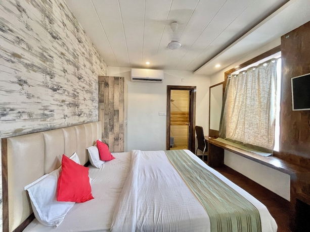 Imagen de la habitación del Hotel Janaki - near Ghats and Temples. Foto 14