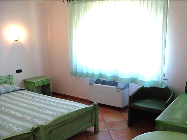 Imagen de la habitación del Hotel Janas, Cerde&ntilde;a. Foto 7