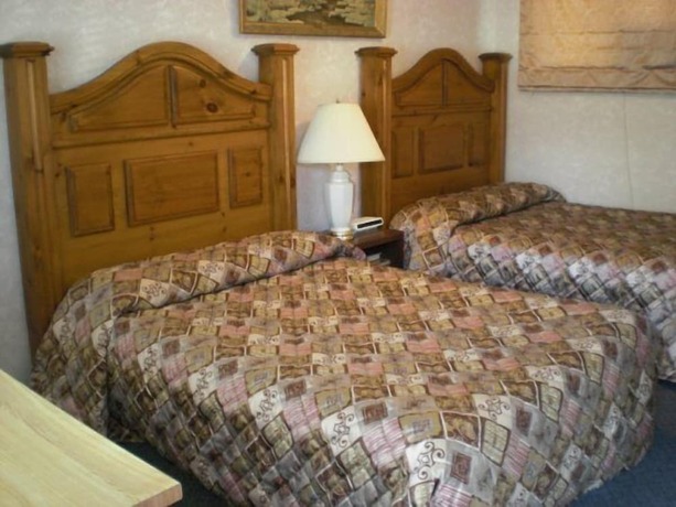 Imagen de la habitación del Hotel JandJ Motel. Foto 19