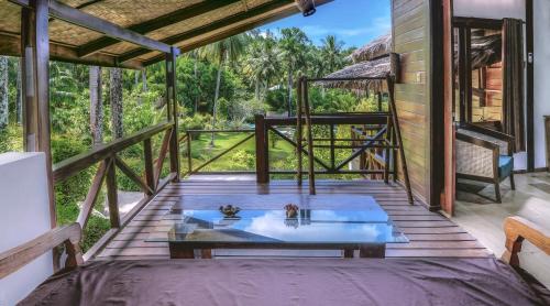 Imagen de la habitación del Hotel Janji Laut Resort. Foto 6