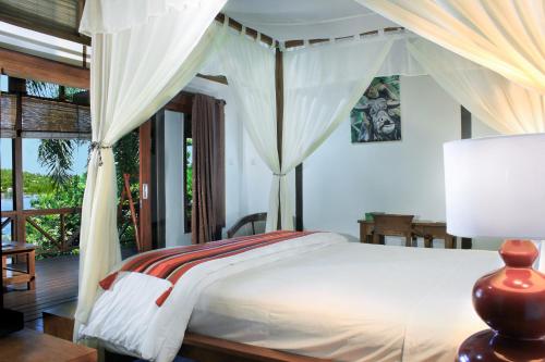 Imagen de la habitación del Hotel Janji Laut Resort. Foto 8