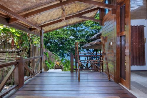 Imagen de la habitación del Hotel Janji Laut Resort. Foto 9