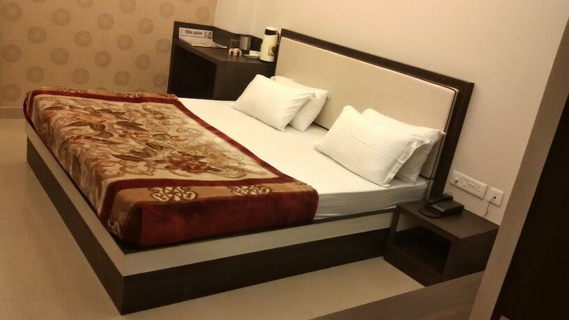 Imagen de la habitación del Hotel Janki International. Foto 18