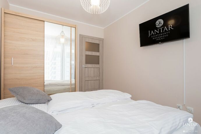 Imagen de la habitación del Hotel Jantar Apartamenty Bliżej Morza. Foto 14