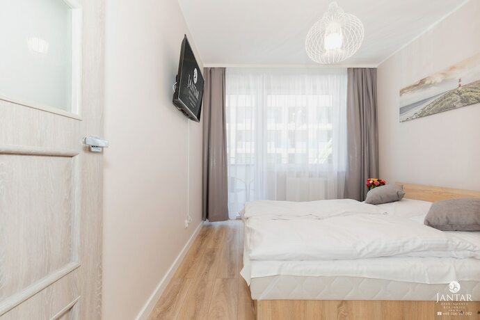 Imagen de la habitación del Hotel Jantar Apartamenty Bliżej Morza. Foto 17
