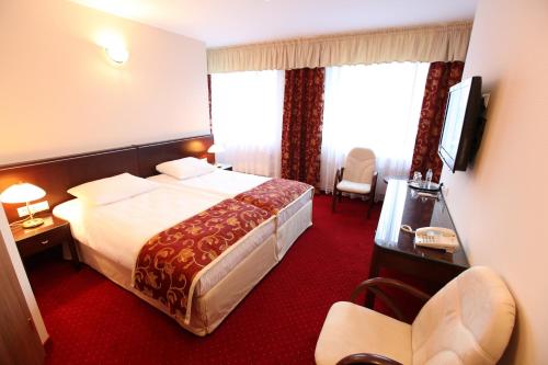 Imagen de la habitación del Hotel Janusz. Foto 8