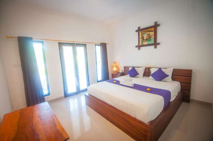 Imagen de la habitación del Hotel Japa Bungalow. Foto 19