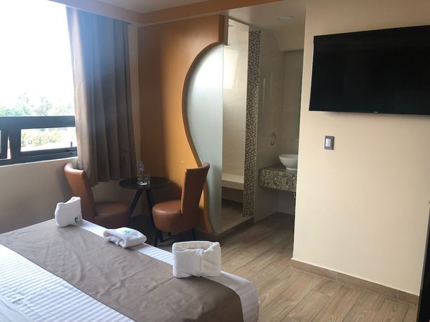 Imagen de la habitación del Hotel Jard Inn Adults only. Foto 14