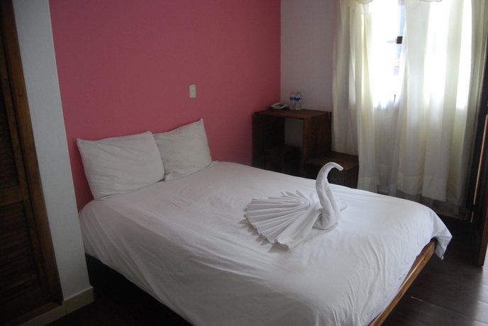 Imagen de la habitación del Hotel Jardines De Luz. Foto 6