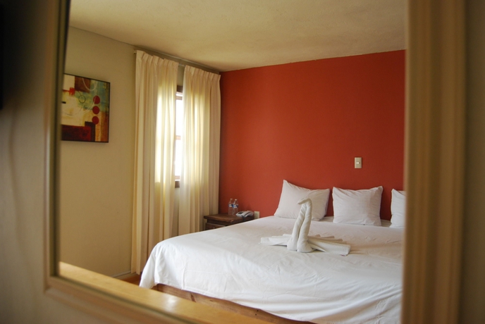 Imagen de la habitación del Hotel Jardines De Luz. Foto 8