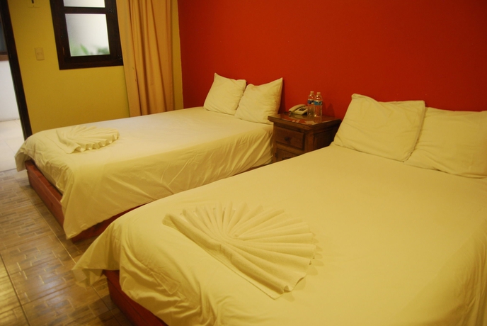 Imagen de la habitación del Hotel Jardines De Luz. Foto 12