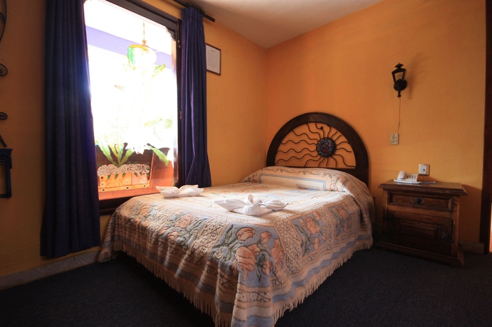 Imagen de la habitación del Hotel Jardines Del Carmen. Foto 9