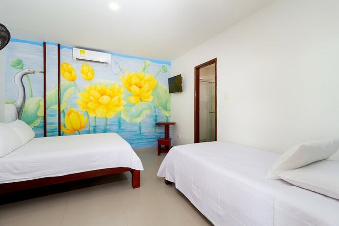 Imagen de la habitación del Hotel Jardines Evans By Geh Suites. Foto 15