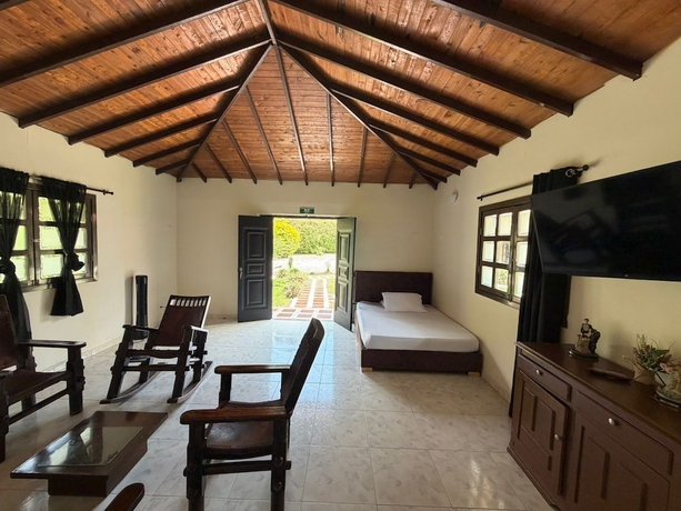 Imagen de la habitación del Hotel Jardines del cafe entre nubes. Foto 11