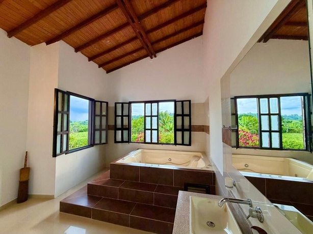 Imagen de la habitación del Hotel Jardines del cafe entre nubes. Foto 15