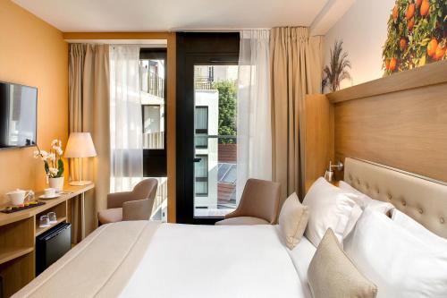 Imagen de la habitación del Hotel Jardins De Mademoiselle Hôtel & Spa. Foto 7