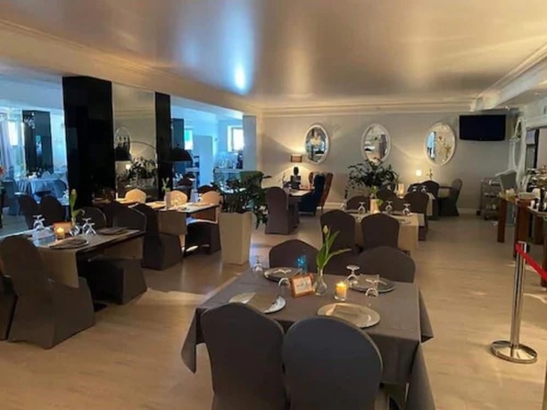 Imagen del bar/restaurante del Hotel Jasek Premium Wrocław. Foto 13