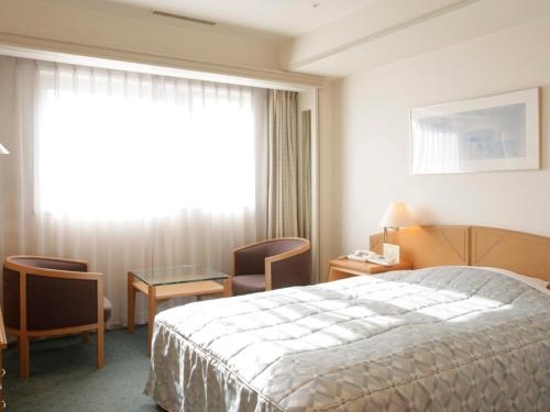 Imagen de la habitación del Hotel Jasmac Plaza. Foto 10